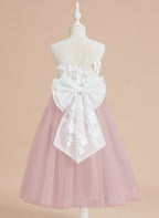 Vestido midi de encaje floral y lazo grande 