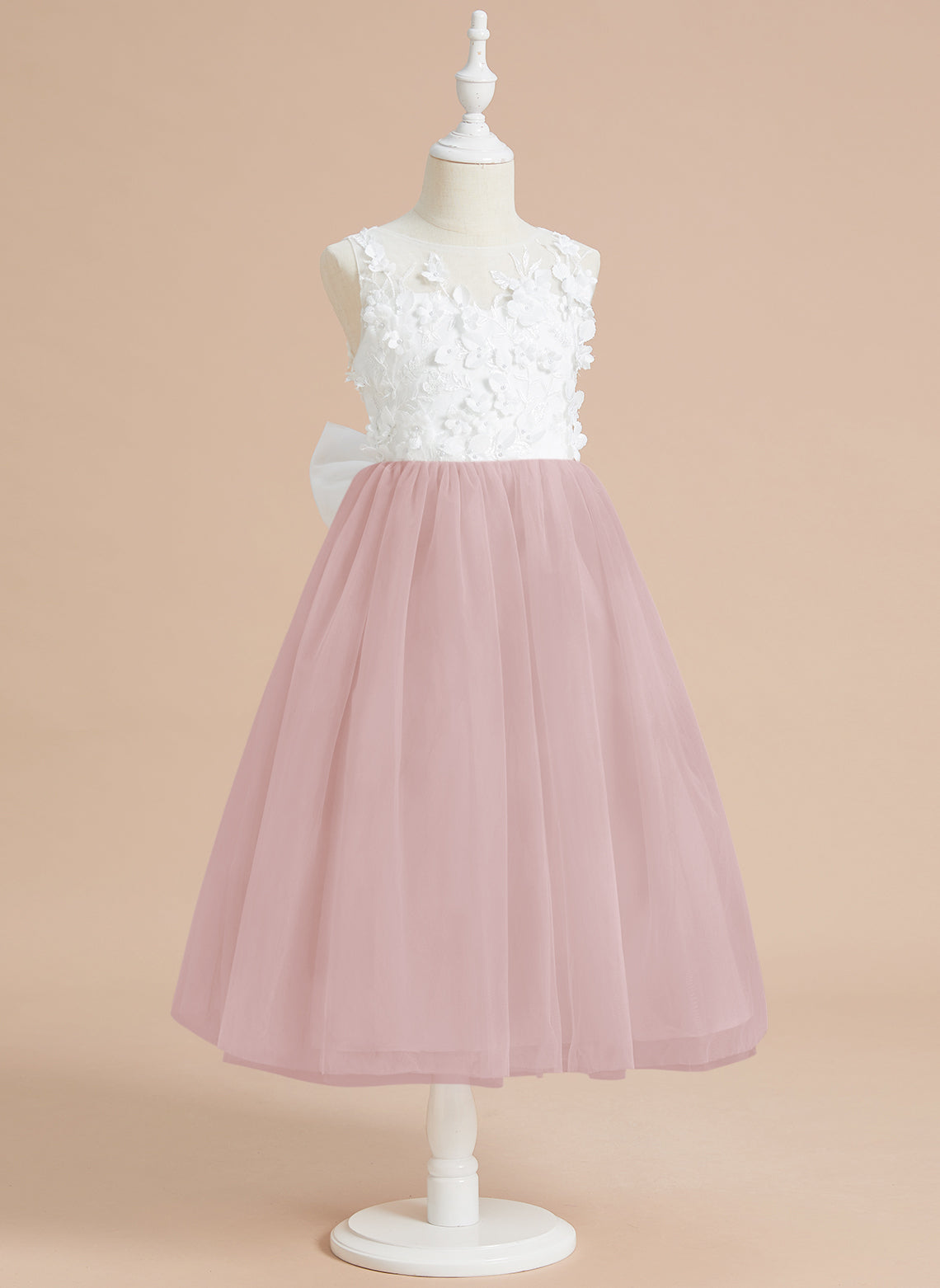 Vestido midi de encaje floral y lazo grande 