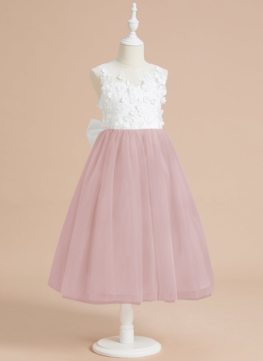 Vestido midi de encaje floral y lazo grande 