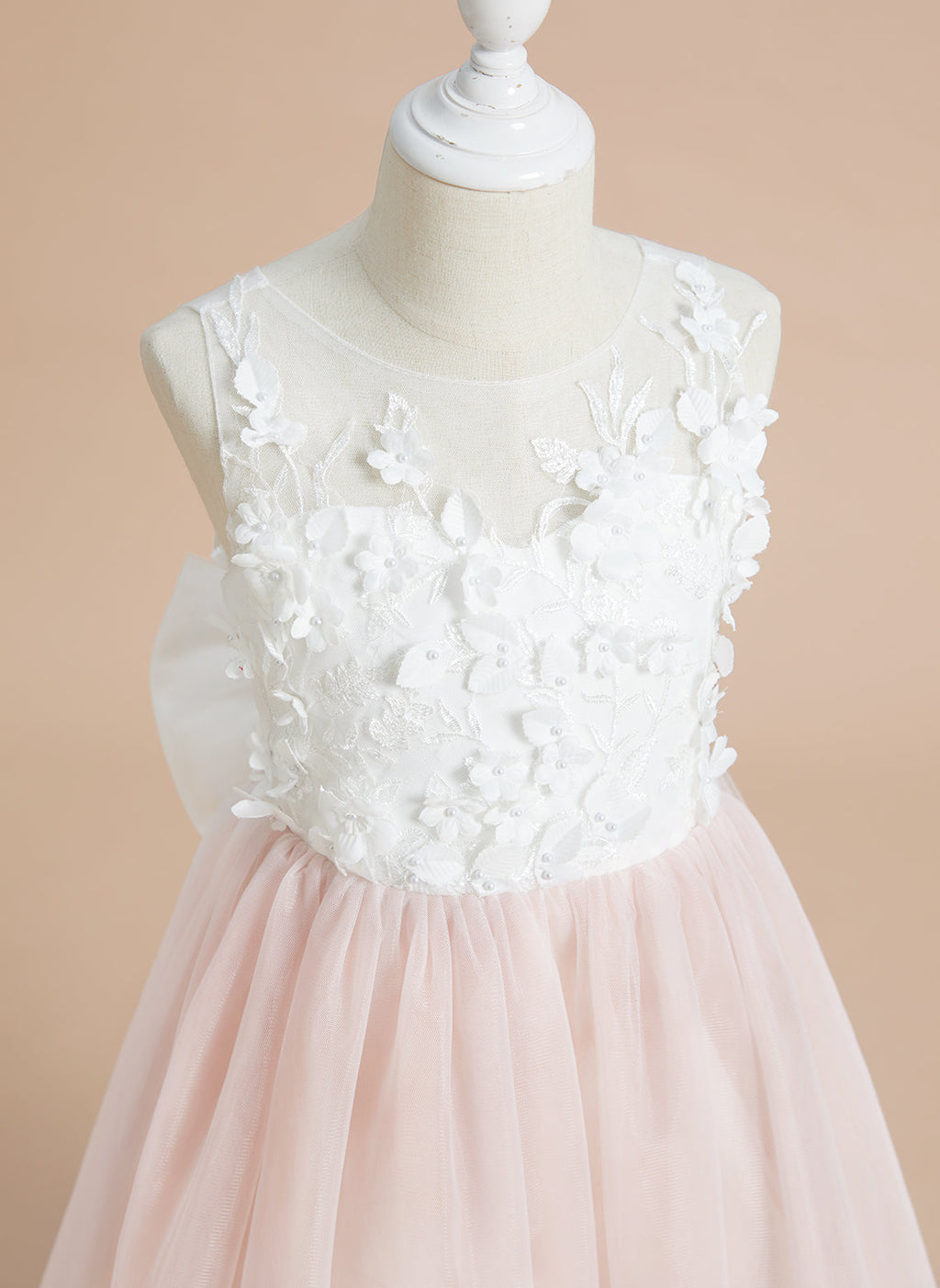 Vestido midi de encaje floral y lazo grande 