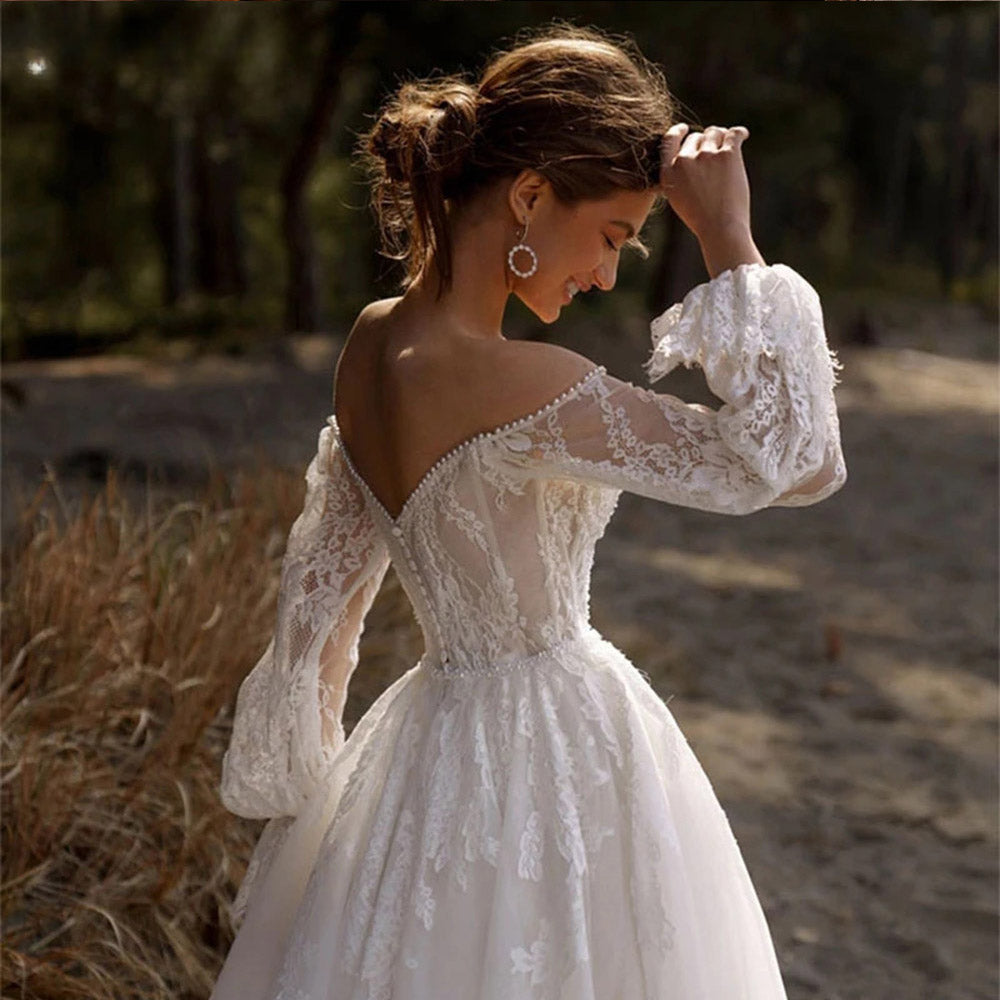 Robe De mariée en dentelle, épaules dénudées, avec des appliques en cœur, manches longues bouffantes 