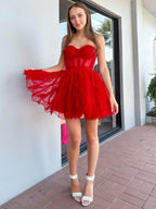 Vestido de fiesta de bienvenida sin tirantes de tul corte A