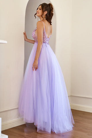 Robe de bal en tulle violet ornée de perles