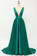 Robe de bal longue en satin rose poudré