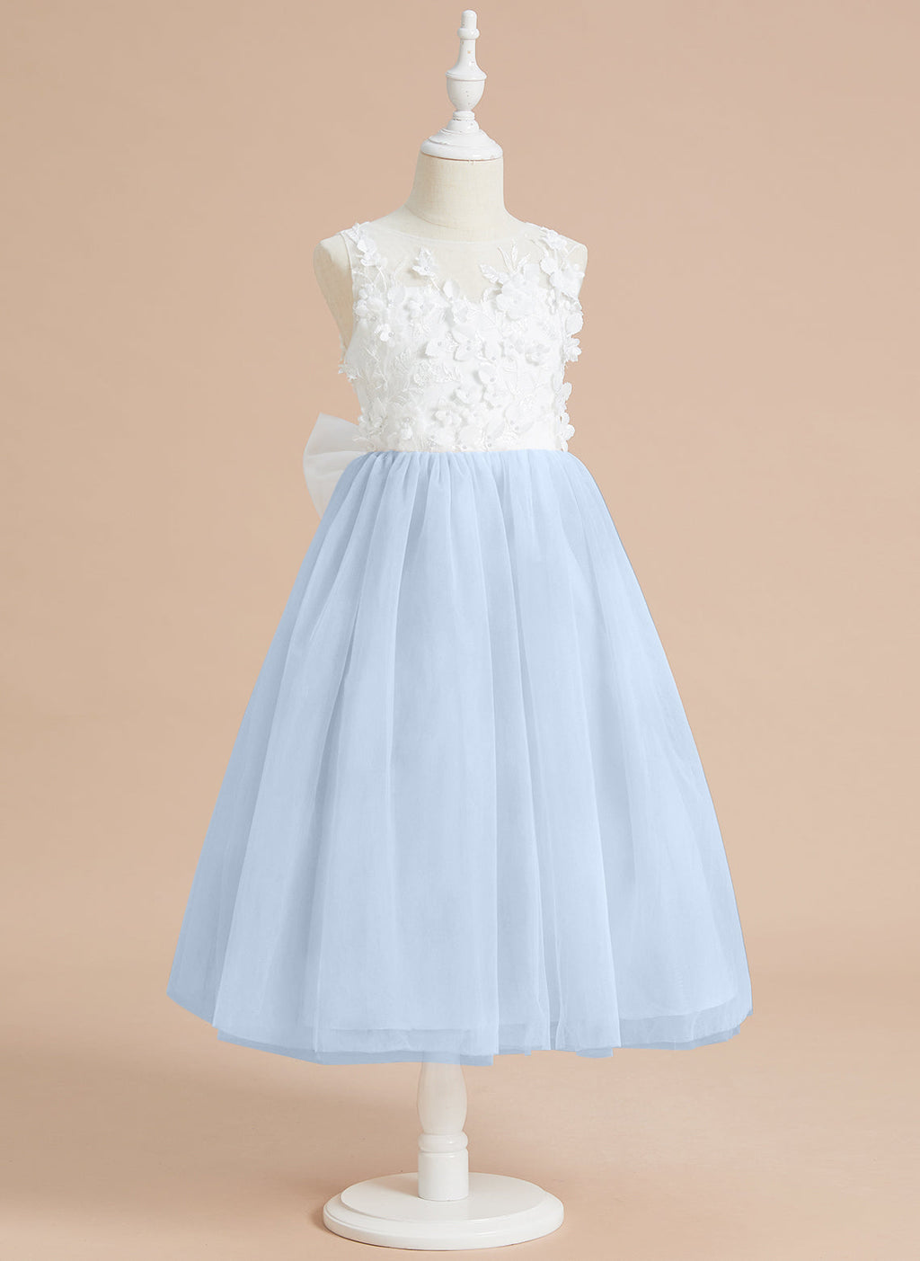 Vestido midi de encaje floral y lazo grande 