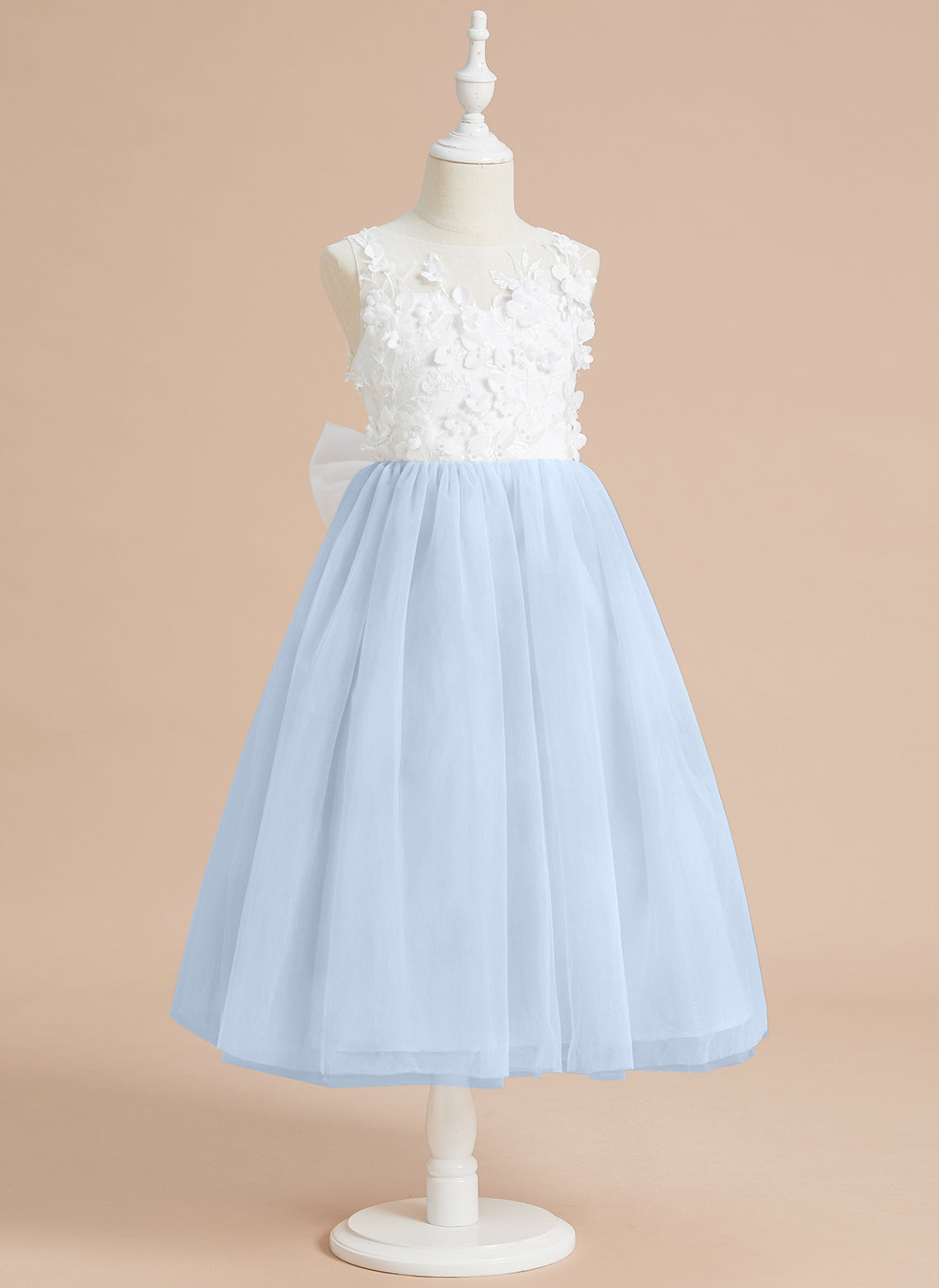 Vestido midi de encaje floral y lazo grande 
