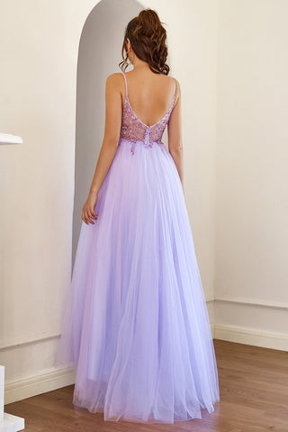 Robe de bal en tulle violet ornée de perles