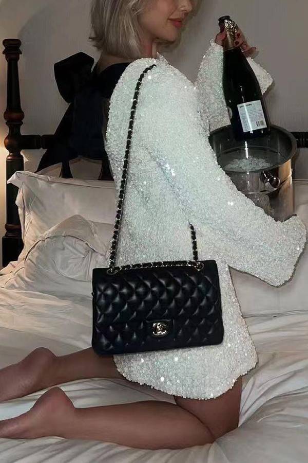 Robe mini ample à paillettes et nœud dans le dos, idéale pour danser toute la nuit 