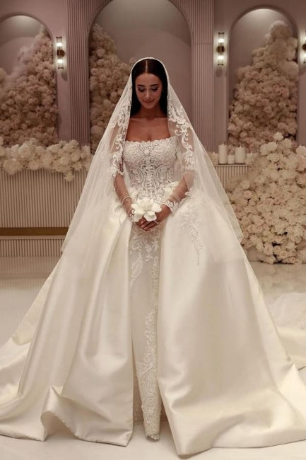 Robe de mariée blanche élégante en tulle, coupe trapèze, sans manches, ornée d'appliques