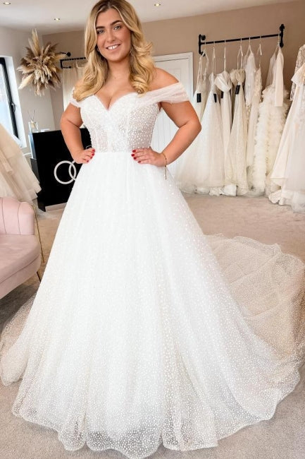 Elegante vestido de novia blanco de corte A, sin mangas, con hombros descubiertos y perlas