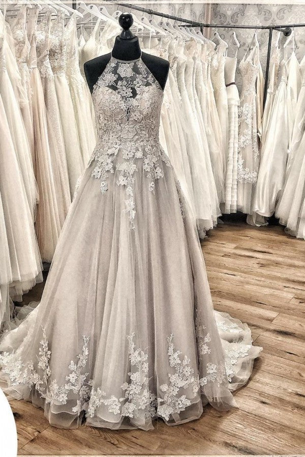 Elegante vestido de novia largo de corte A, escote halter, espalda descubierta, apliques, encaje, tul, volantes y cola