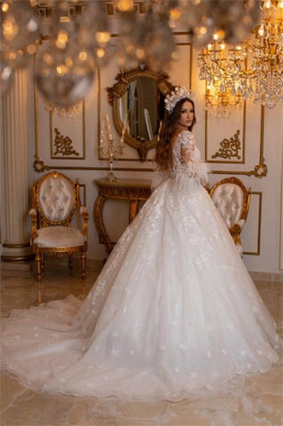 Elegantes vestidos de novia largos de corte A con apliques de encaje y tul, con mangas.