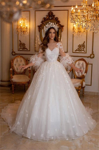 Elegantes vestidos de novia largos de corte A con apliques de encaje y tul, con mangas.