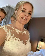 Elegante vestido de novia largo de tul con escote corazón y corte en A