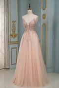 Robe de bal longue élégante en tulle à sequins, dos nu et col en V, coupe trapèze.