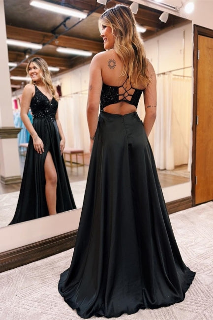 Elegante vestido de noche largo negro de corte A con escote en V, lentejuelas y brillo.