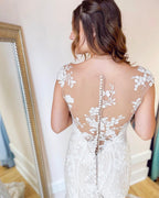 Robe de mariée élégante longue sirène bateau appliques dentelle dos nu