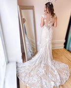 Robe de mariée élégante longue sirène bateau appliques dentelle dos nu