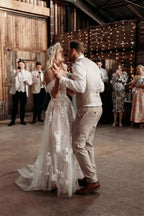 Elegante vestido de novia largo con hombros descubiertos, tul y encaje floral