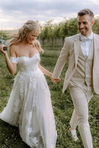 Elegante vestido de novia largo con hombros descubiertos, tul y encaje floral