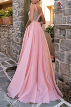 Elegante vestido de noche largo rosa con escote en V, corte en A, sin mangas, con lentejuelas y abertura