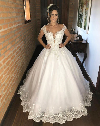 Vestidos de novia largos y elegantes de princesa con apliques de encaje y escote en V