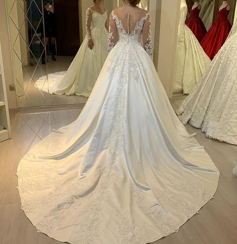 Elegante vestido de novia de manga larga, corte en A, escote corazón, apliques de encaje, perlas y satén