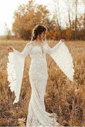 Elegantes vestidos de novia de sirena con espalda descubierta y mangas largas de encaje