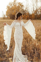 Elegantes vestidos de novia de sirena con espalda descubierta y mangas largas de encaje