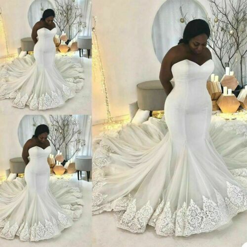 Robe de mariée sirène longue et élégante en dentelle blanche sans manches et décolleté cœur