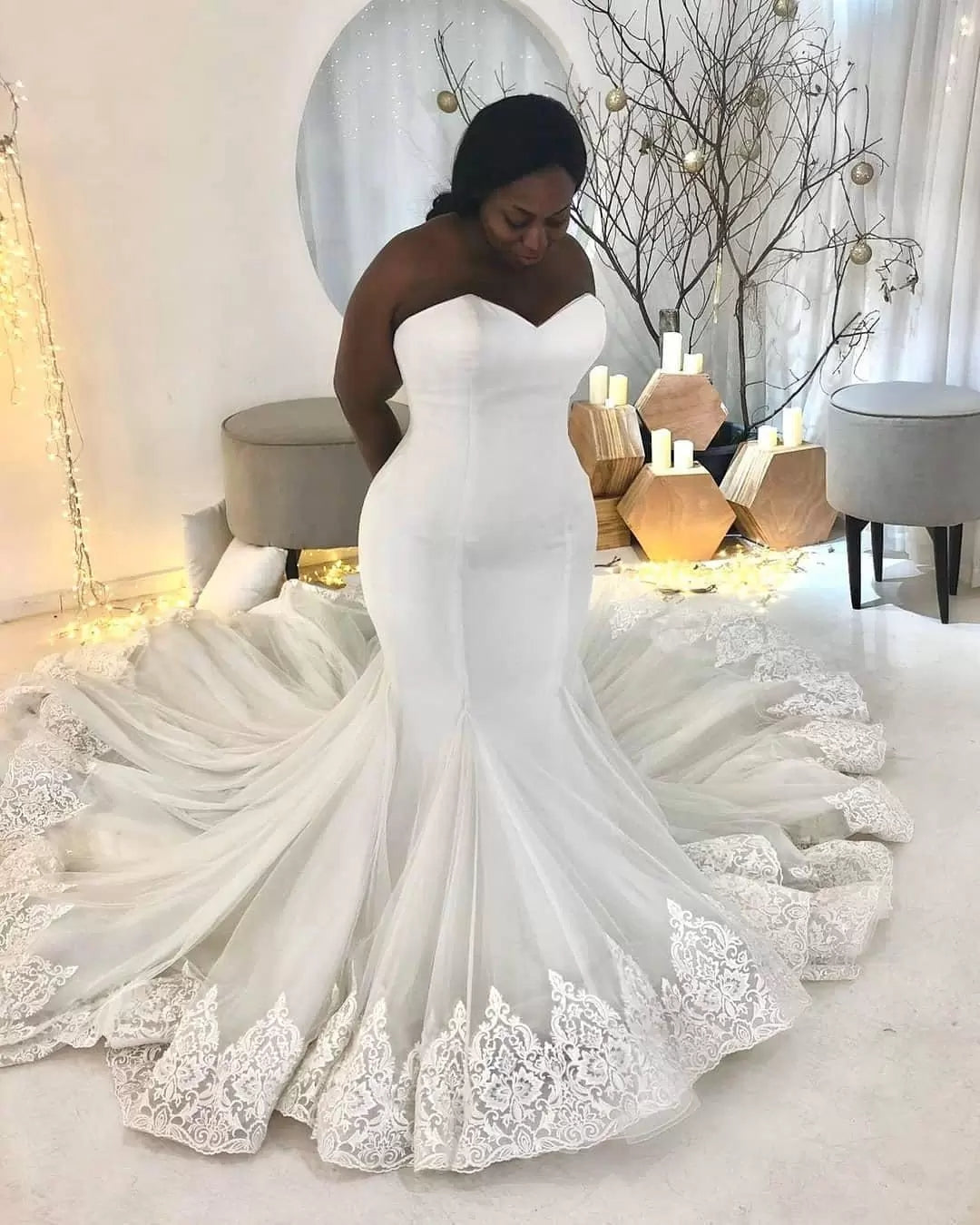 Robe de mariée sirène longue et élégante en dentelle blanche sans manches et décolleté cœur