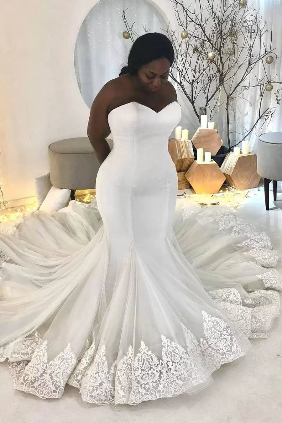 Robe de mariée sirène longue et élégante en dentelle blanche sans manches et décolleté cœur