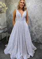 Vestido largo de fiesta de terciopelo con lentejuelas, sin mangas, escote en V y corte en A, con bolsillos.
