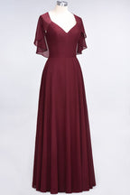 Robe de demoiselle d'honneur princesse élégante en satin à col en V et manches courtes, ornée de volants en mousseline, pour un mariage.