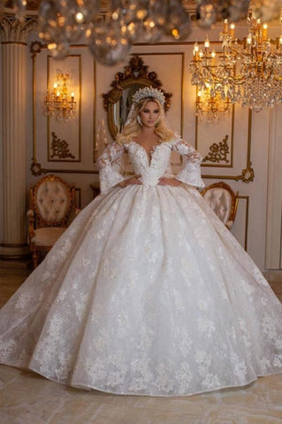 Vestidos de novia de encaje, elegantes, de manga larga y corte princesa con escote corazón.