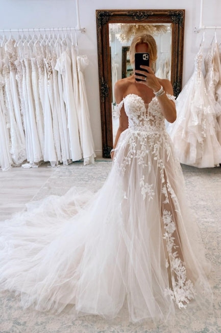 Elegante vestido de novia de encaje con escote corazón, hombros descubiertos y mangas cortas, corte en A