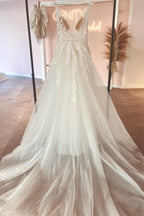 Elegantes vestidos de novia de encaje con escote corazón en V, sin mangas y corte en A