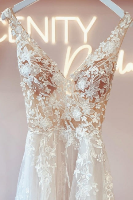 Vestidos de novia elegantes con escote en V, sin mangas, corte en A y espalda descubierta, de encaje.