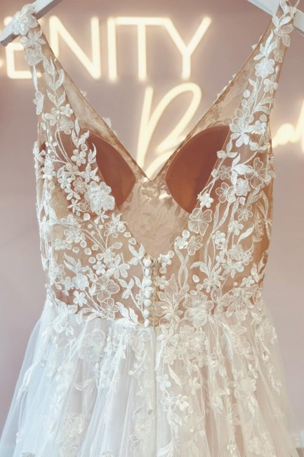 Vestidos de novia elegantes con escote en V, sin mangas, corte en A y espalda descubierta, de encaje.