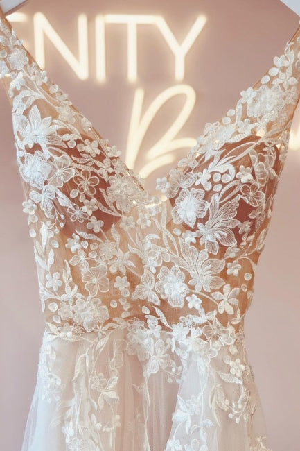 Vestidos de novia elegantes con escote en V, sin mangas, corte en A y espalda descubierta, de encaje.