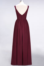 Robe de demoiselle d'honneur élégante en mousseline de soie, dos nu, décolleté en V et volants.