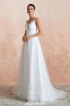 Robe de mariée élégante en tulle et perles, col en V, idéale pour la plage