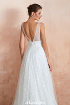 Robe de mariée élégante en tulle et perles, col en V, idéale pour la plage