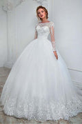 Robe de mariée élégante blanche à manches longues en tulle, ornée d'appliqués de dentelle et d'une coupe trapèze. 