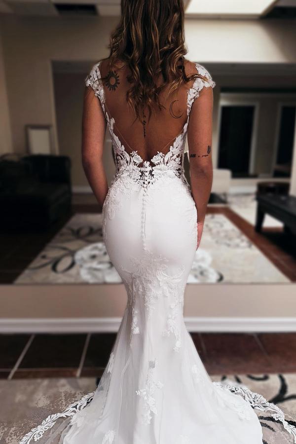 Robe de mariée sirène longue élégante, décolleté cœur, sans manches, traîne chapelle et dos nu