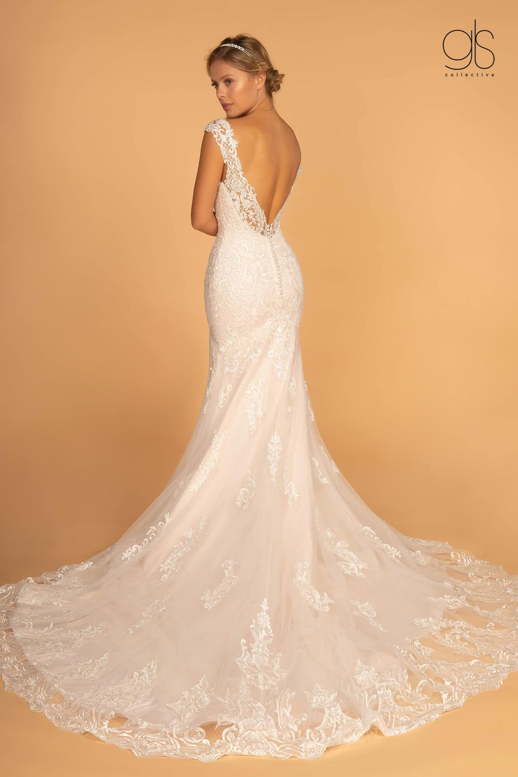 Robe de mariée longue en tulle ornée de broderies