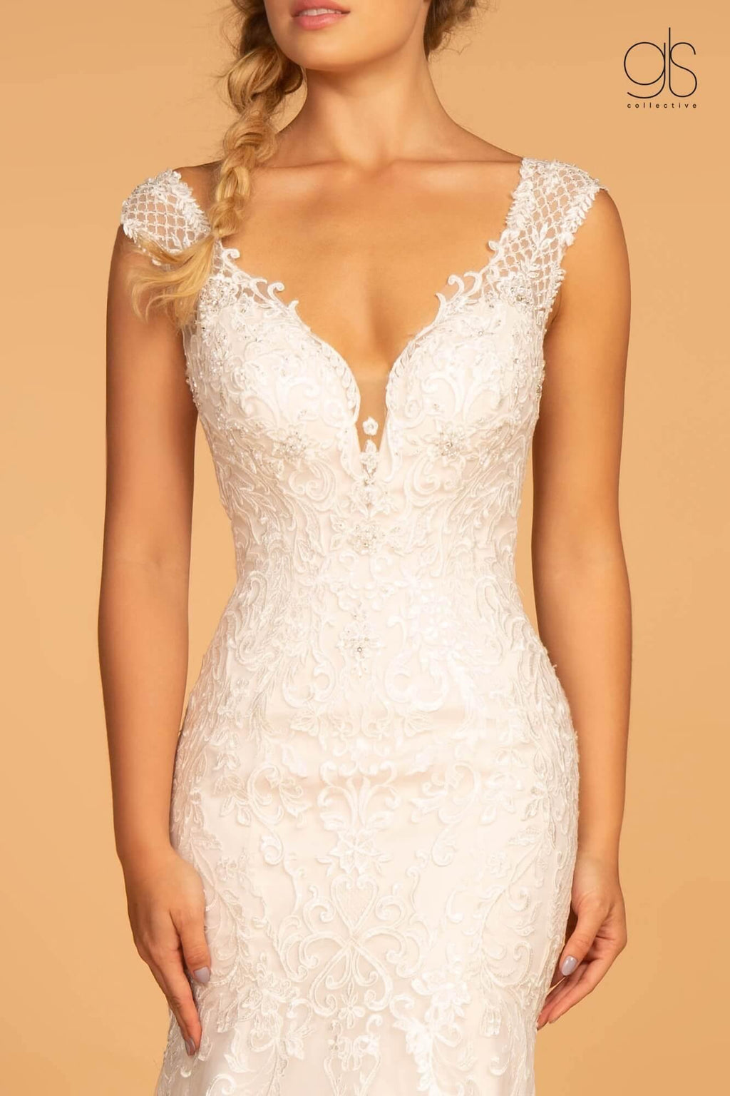 Robe de mariée longue en tulle ornée de broderies