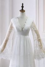 Robe de mariée empire en tulle et dentelle à manches longues 