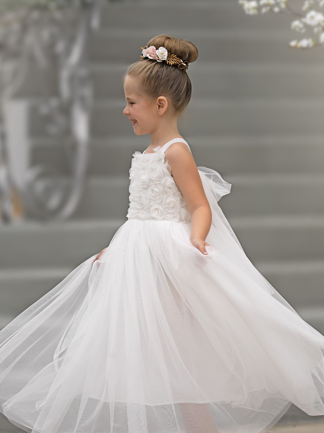 Vestido de bebé niña con lazo de tul y aplique floral en 3D de la colección Jardín Encantado 