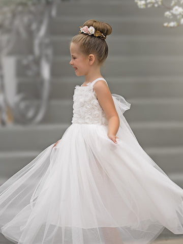 Vestido de bebé niña con lazo de tul y aplique floral en 3D de la colección Jardín Encantado 